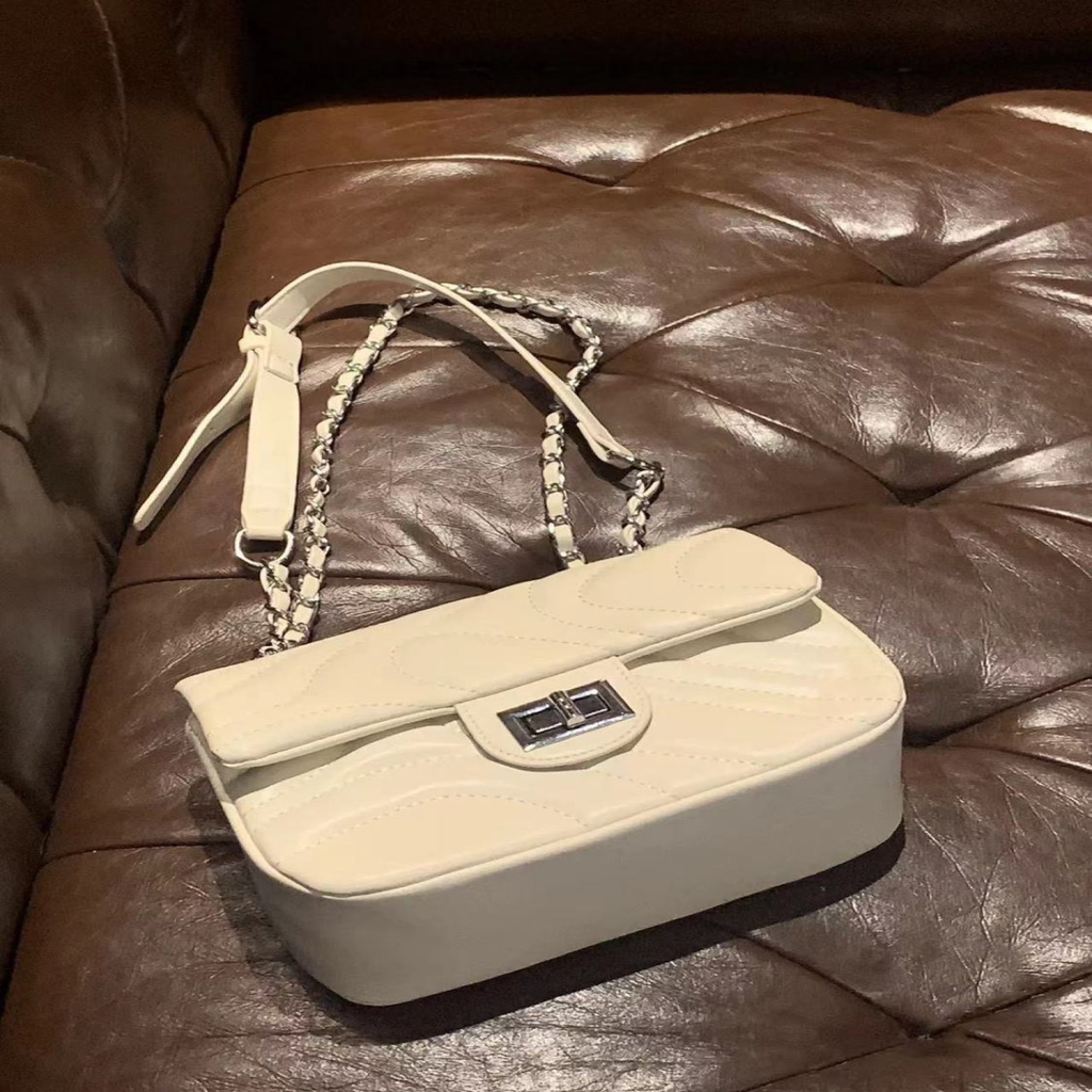 Wave-Quilted Chain Shoulder Bag